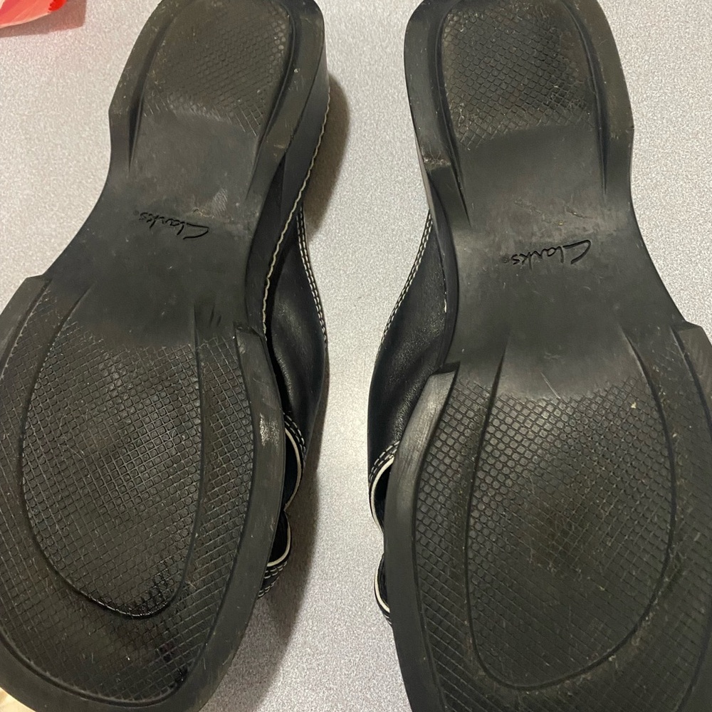 Clarks Black Slide Sandals with White Stitching - Picture 2 of 3